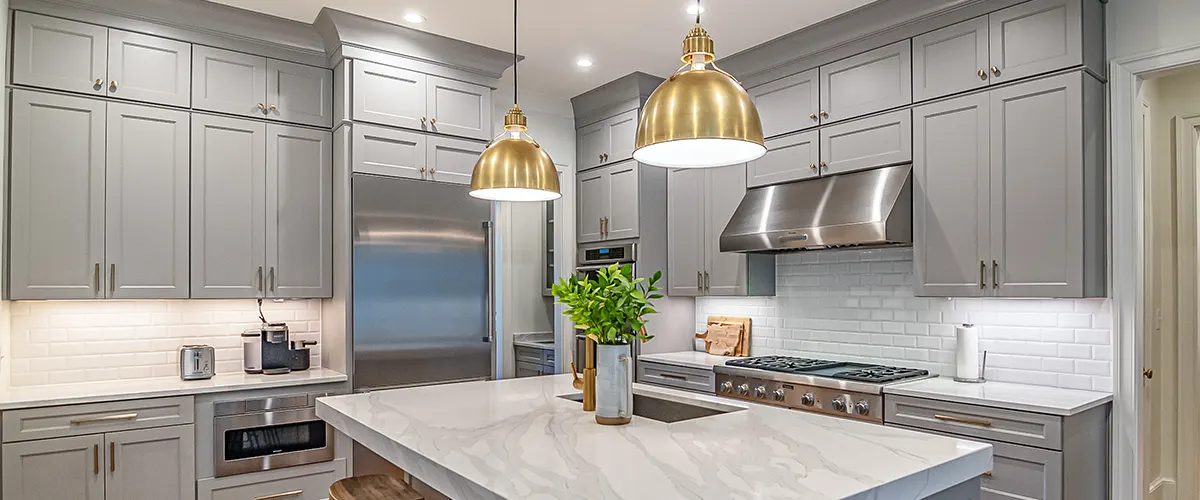 gray cabinets with golden lights