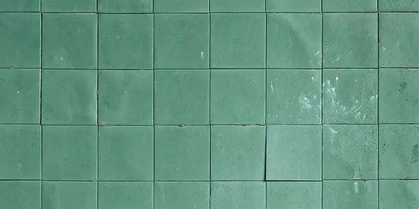 Green, dirty tile
