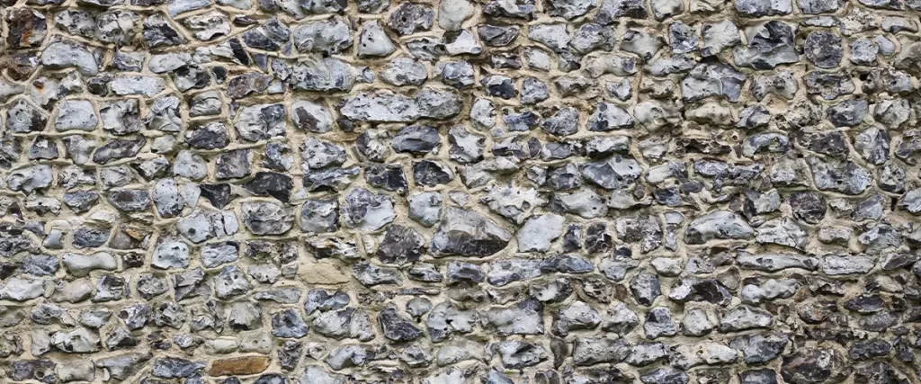 Grey flint wall background showing texture