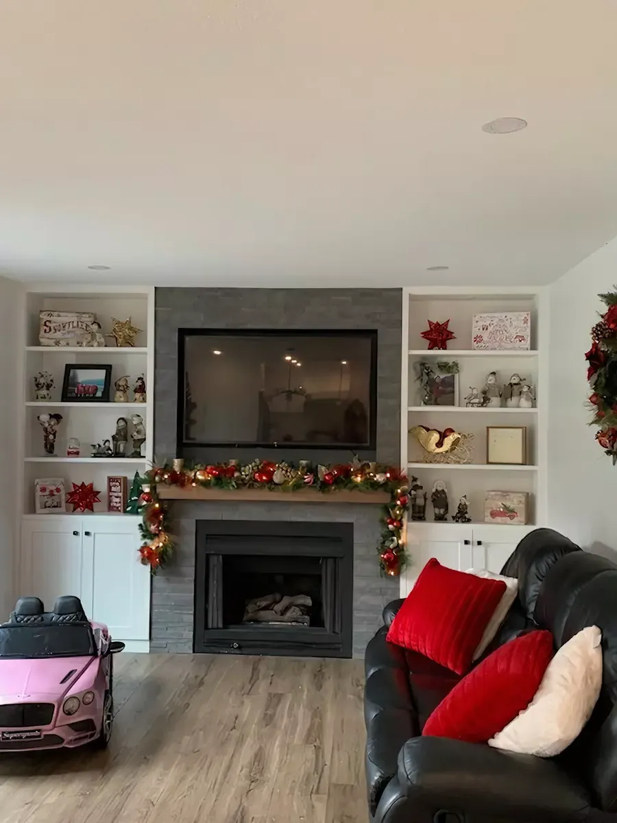Fireplace and living room after renovation from City & Country Contracting