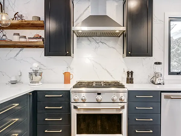 White marble backsplash in modern luxurious kitchen renovation