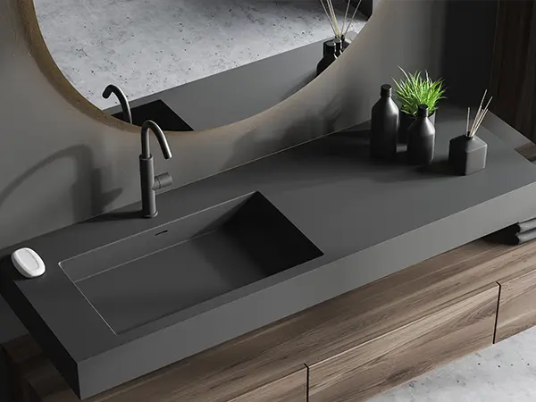 Minimalist black countertop and sink for modern bathroom