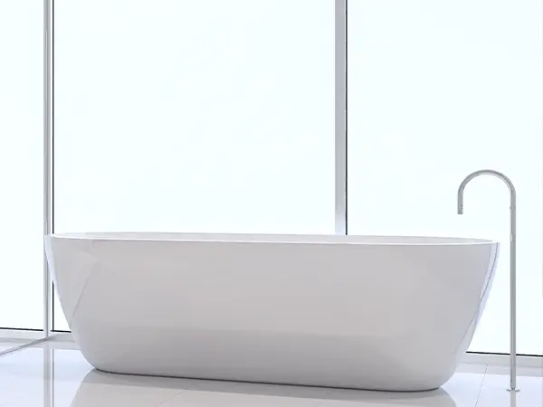 A free standing tub near a large window
