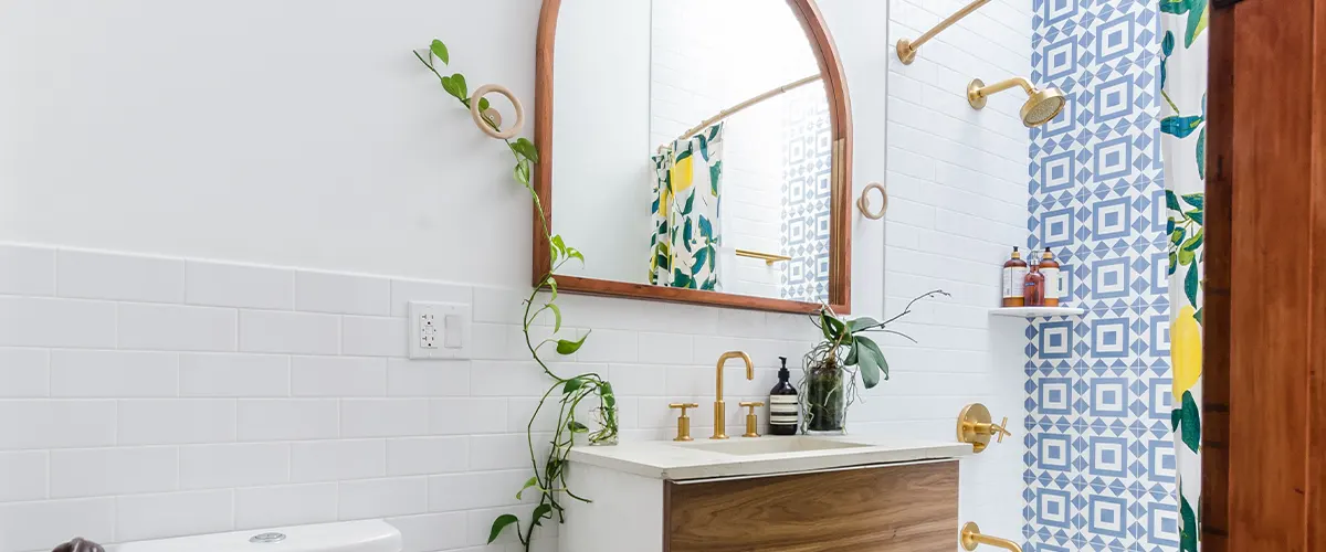 bathroom with plants and wall tiles