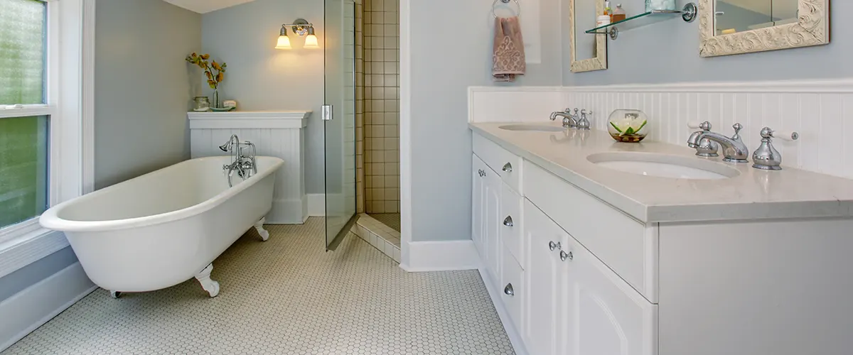 tile flooring in simple bath with blue walls