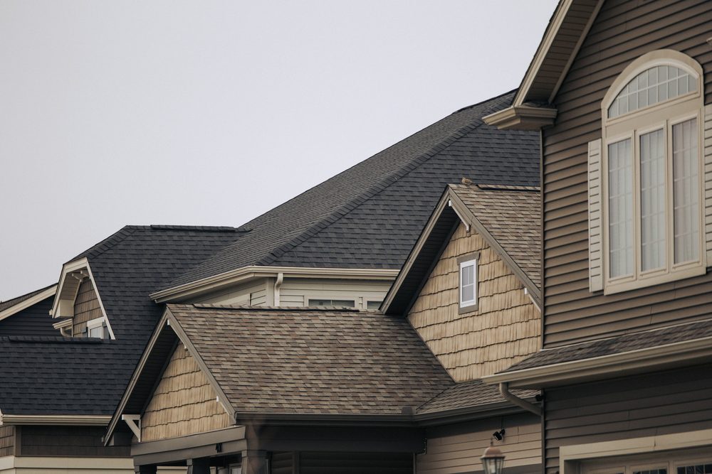 Repaired asphalt shingle roof by City & Country Contracting in Surrey